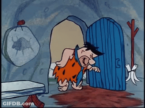 Flintstone By Blue Door With Letter G GIF
