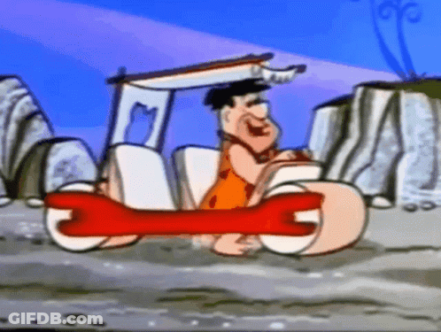 Flintstone Driving Car With Large Bone GIF