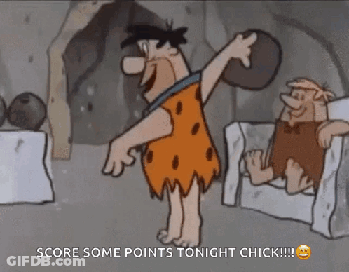 Flintstone Is Holding A Bowling Ball In His Hand While Standing In Front Of Bowling Balls . GIF