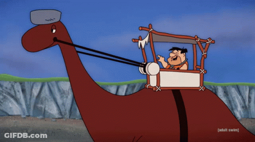 Flintstone Playing Banjo On Beach GIF