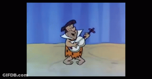 Flintstone Playing Banjo On Beach GIF