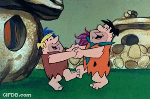 Flintstones Dancing In Front Of Stone House GIF