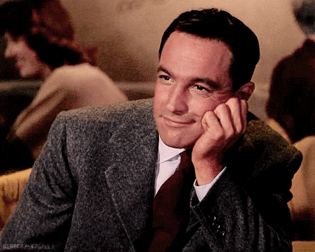 Flirt Guy Smiling Slyly GIF
