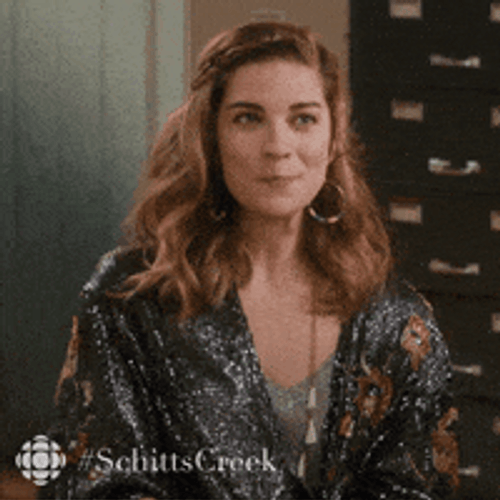 Flirt Woman Smiling And Giggles GIF
