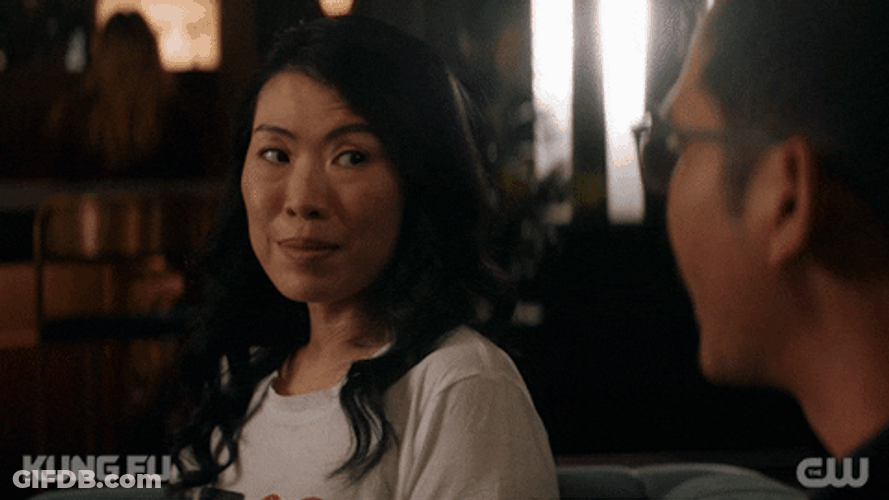 Flirting Woman Grin Face Kung Fu GIF