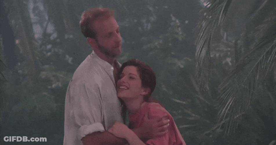 Flirty Couple In Forest GIF