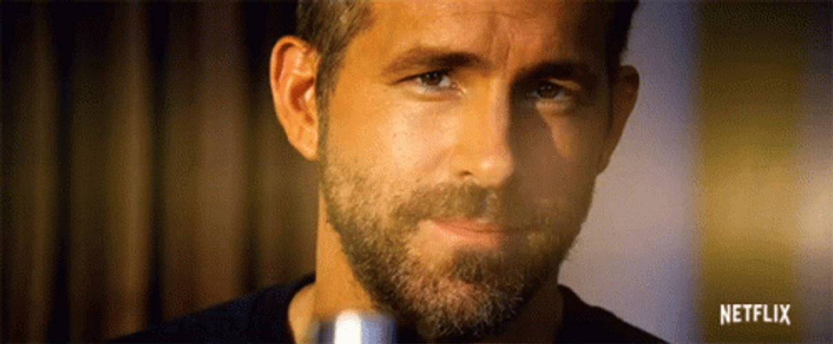 Flirty Eyebrow Raise Ryan Reynolds GIF