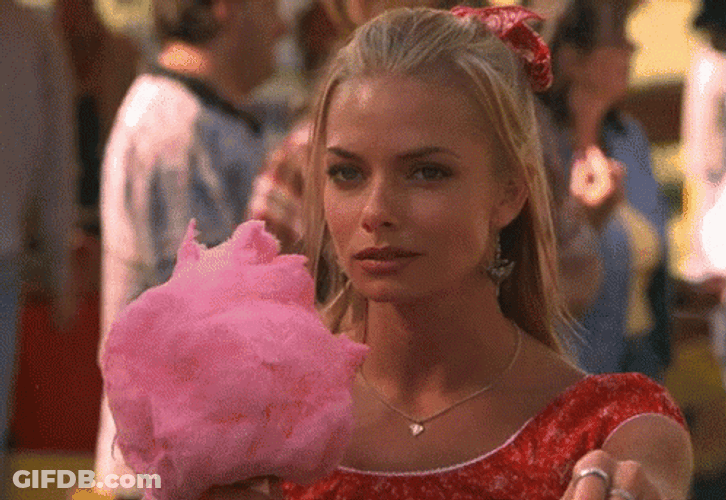Flirty Jaime Pressly Licking Cotton Candy GIF