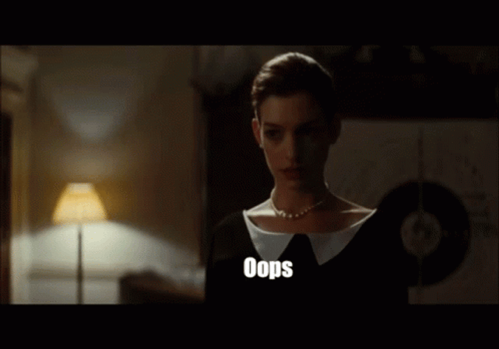Flirty Oops Anne Hathaway GIF