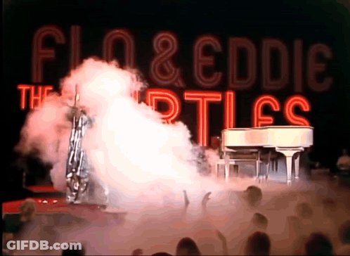 Flo And Eddie Turtles Playing Piano On Stage GIF