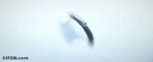 Floating Ring In Front Of Mountain GIF