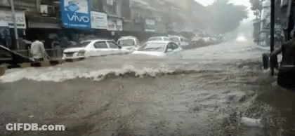 Flooded Street With Vivo Sign GIF