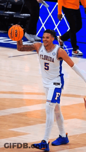 Florida Basketball Player Holding Orange Wilson GIF