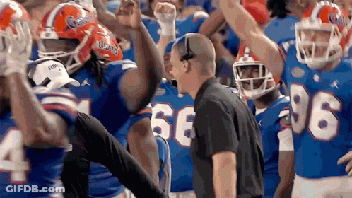 Florida Football Players Celebrating Win GIF