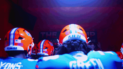Florida Football Players Huddled In Locker Room GIF