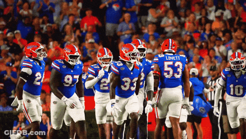Florida Football Players Including Lovett And Number 53 GIF