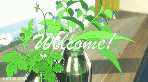 Flowers In Vase Saying Welcome GIF