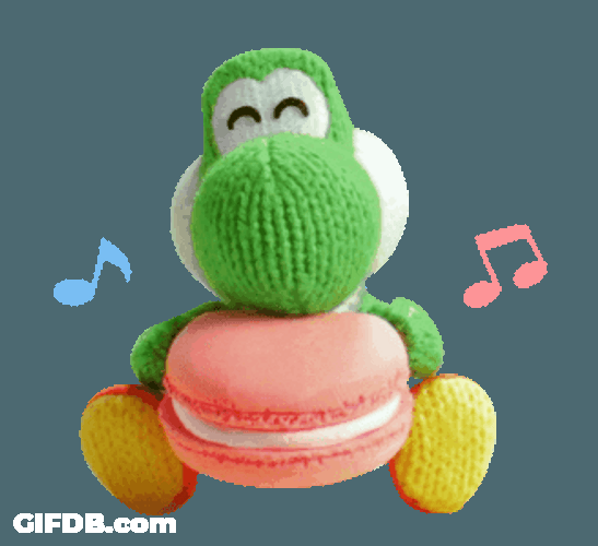 Fluffy Yoshi Holding Macaroons GIF