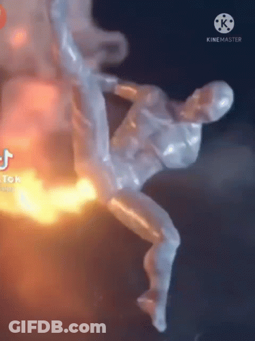 Flying Statue With Fire Behind GIF
