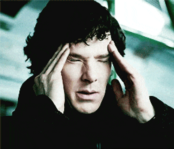 Focused Sherlock Holmes Deep Thinking GIF