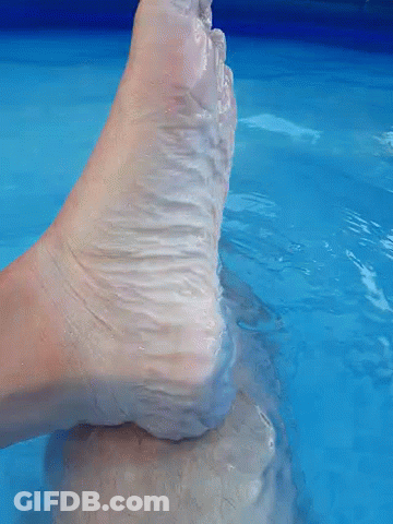 Foot Sticking Out Of Blue Pool GIF
