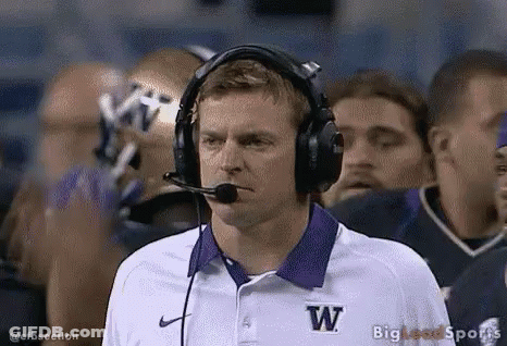Football Coach In Headphones And Purple W Shirt GIF