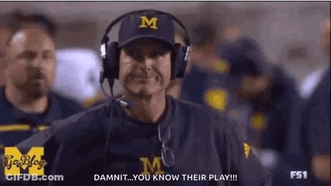 Football Coach With Headphones Talking To Players GIF