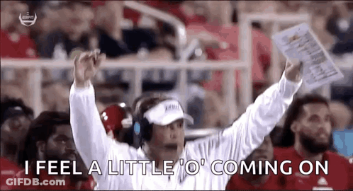 Football Coach Yelling At Players Holding Paper GIF