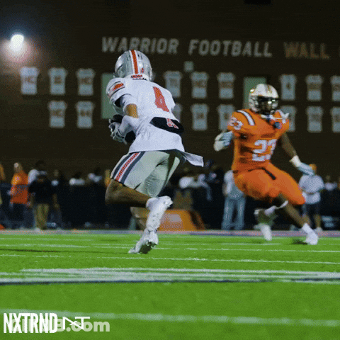 Football Game At Warrior Football Wall GIF
