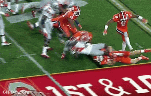 Football Game In Front Of 1St & 10 Banner GIF