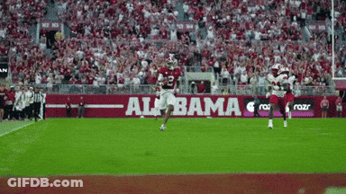 Football Game In Front Of Alabama Banner GIF