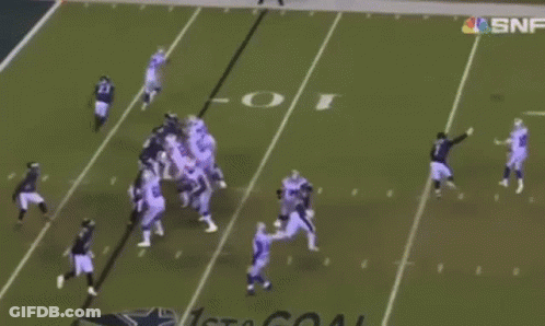 Football Game In Front Of Catch Banner GIF