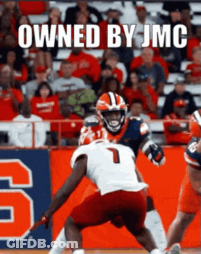 Football Game In Front Of Crowd With Owned By JMC Sign GIF