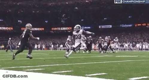 Football Game In Front Of Fox Championship Banner GIF