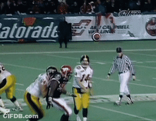 Football Game In Front Of Gatorade Banner GIF