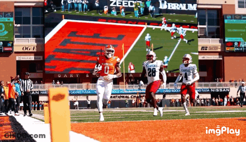 Football Game In Front Of Imgplay Screen GIF