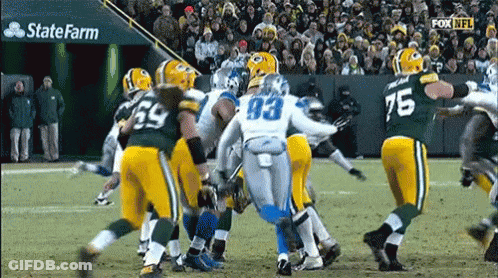 Football Game In Front Of State Farm Sign GIF