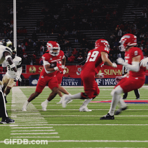 Football Game In Front Of Sun-M Advertisement GIF