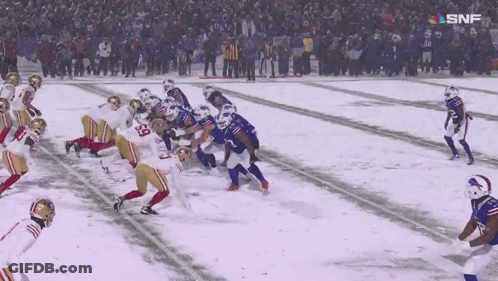 Football Game In Snow With SNF Logo GIF