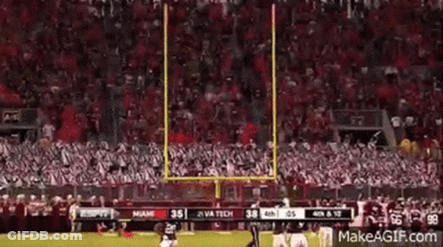 Football Game In Stadium With Crowd GIF