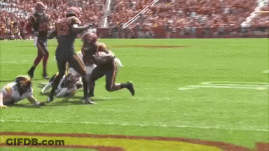 Football Game On Field With Stadium GIF