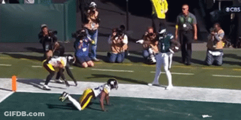Football Game With CBS Sign GIF
