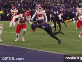 Football Game With Players In Red And White Uniforms GIF