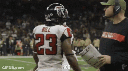 Football Player 23 Talking To Coach GIF