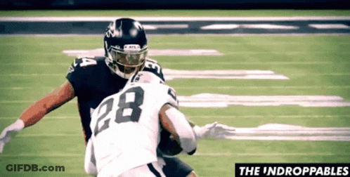 Football Player 28 Tackled By Another Player GIF