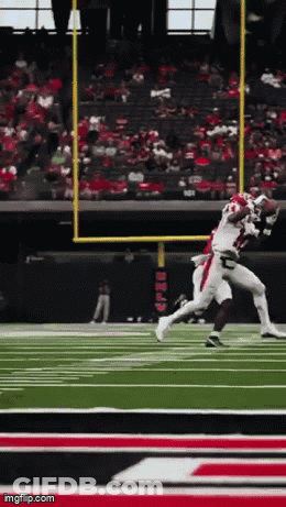 Football Player 38 Being Tackled GIF