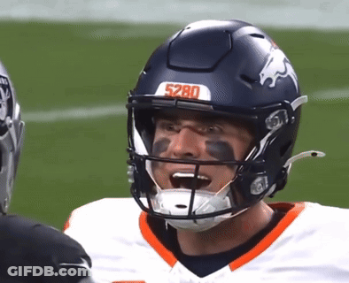 Football Player 5280 Helmet Talking To Another Player GIF
