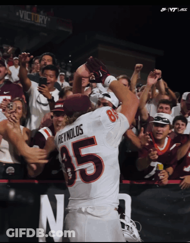 Football Player 85 Surrounded By Fans GIF