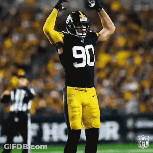 Football Player Arms Up With Referee GIF