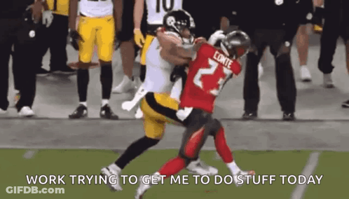 Football Player Being Tackled During Game GIF